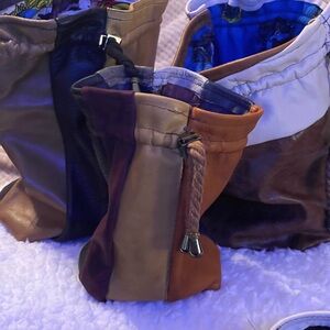 Handmade medium leather bags; that hold 8-12 ounces. Made out of scrap leather.